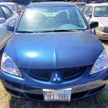 2004 Mitsubishi Lancer for sale at Ody's Autos in Houston TX