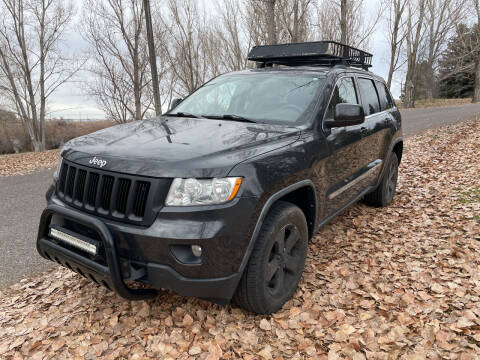 2011 Jeep Grand Cherokee for sale at BELOW BOOK AUTO SALES in Idaho Falls ID