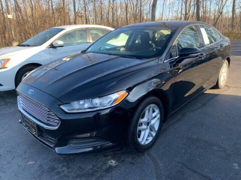 2016 Ford Fusion for sale at Lighthouse Auto Sales in Holland MI