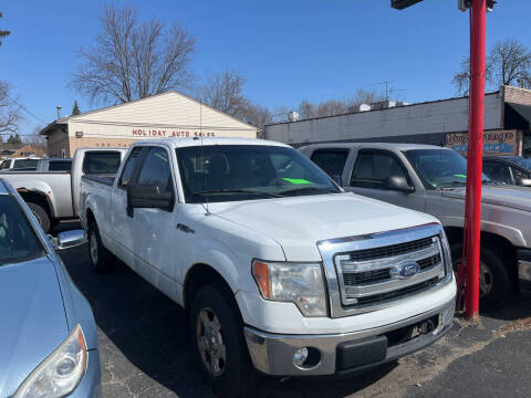 2014 Ford F-150 for sale at Holiday Auto Sales in Grand Rapids MI