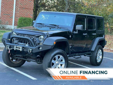 2013 Jeep Wrangler Unlimited for sale at Two Brothers Auto Sales in Loganville GA