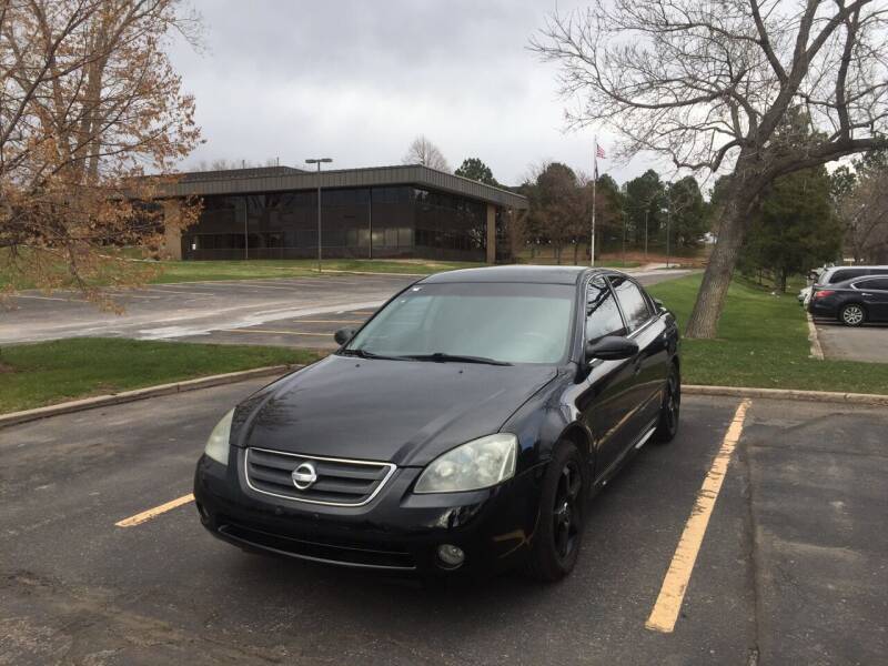 2004 Nissan Altima for sale at QUEST MOTORS in Englewood CO