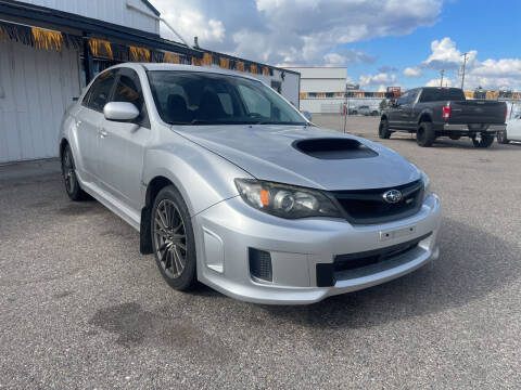 2011 Subaru Impreza for sale at BELOW BOOK AUTO SALES in Idaho Falls ID