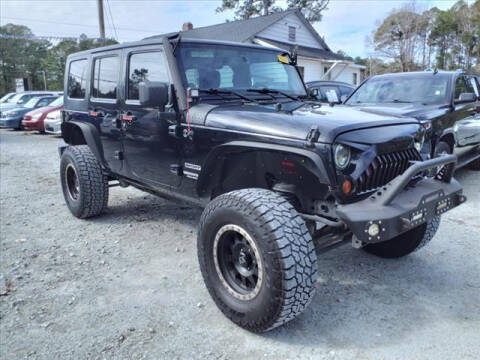 2013 Jeep Wrangler Unlimited for sale at Town Auto Sales LLC in New Bern NC