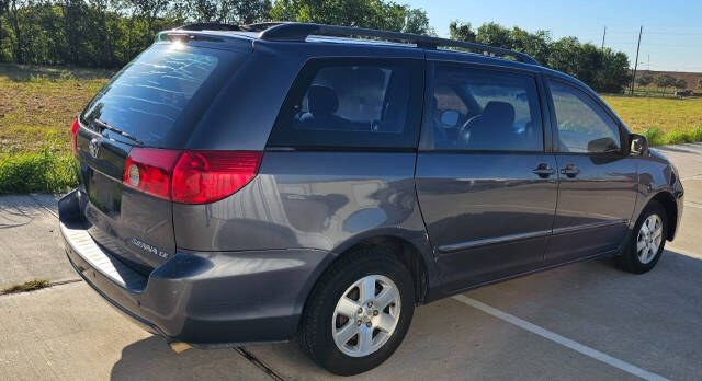 2006 Toyota Sienna for sale at CAR MARKET AUTO GROUP in Sugar Land, TX