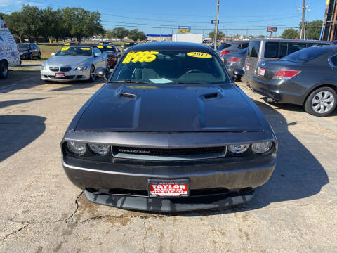 2013 Dodge Challenger for sale at Taylor Trading Co in Beaumont TX