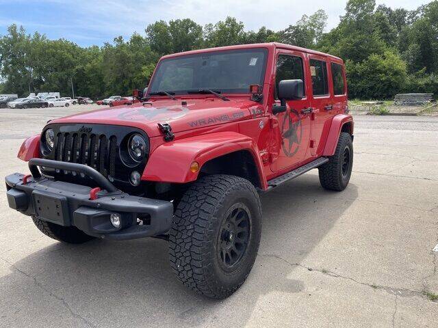 2015 Jeep Wrangler Unlimited for sale at Monster Motors in Michigan Center MI