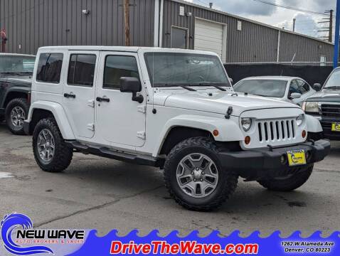 2013 Jeep Wrangler Unlimited for sale at New Wave Auto Brokers & Sales in Denver CO