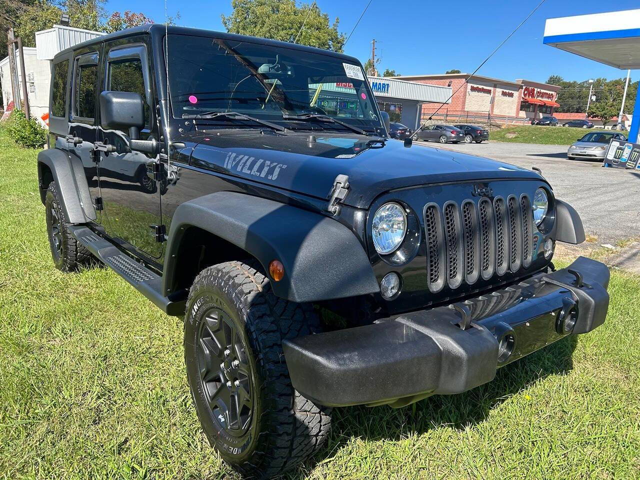 2015 Jeep Wrangler Unlimited for sale at BARRETT & SONS in Milledgeville, GA