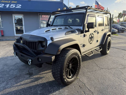 2012 Jeep Wrangler Unlimited for sale at America Auto Wholesale Inc in Miami FL