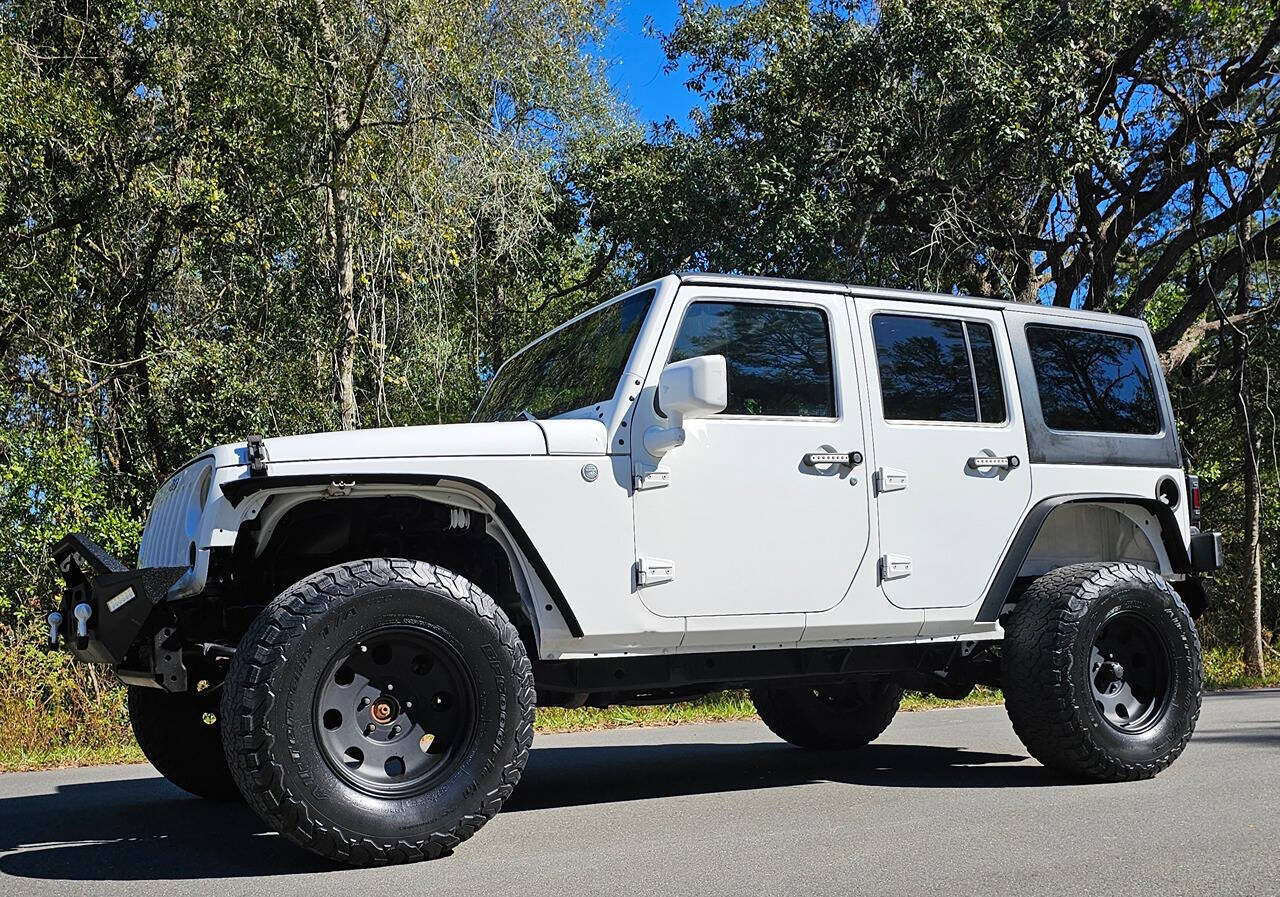 2011 Jeep Wrangler Unlimited for sale at Prime Auto & Truck Sales in Inverness, FL