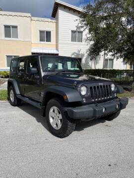 2014 Jeep Wrangler Unlimited for sale at SOUTH FLORIDA AUTO in Hollywood FL