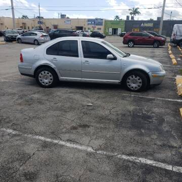 2004 Volkswagen Jetta for sale at OLAVTO EXPORT INC in Hollywood FL