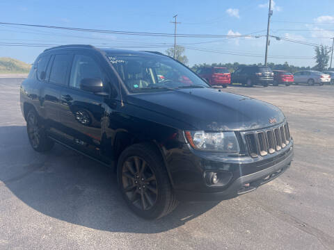 2016 Jeep Compass for sale at HEDGES USED CARS in Carleton MI