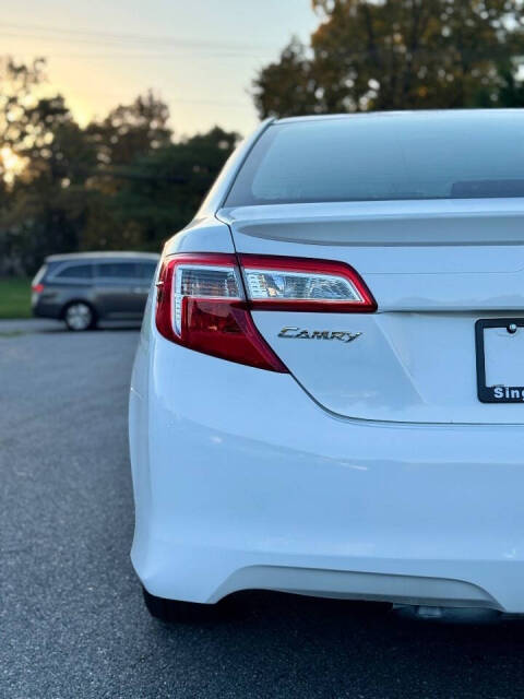 2013 Toyota Camry for sale at Singh's Auto Sales in Jessup, MD