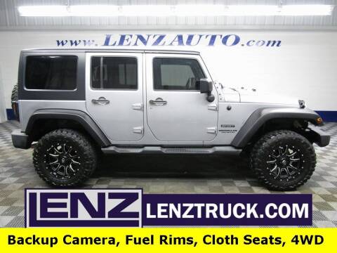 2016 Jeep Wrangler Unlimited for sale at LENZ TRUCK CENTER in Fond Du Lac WI