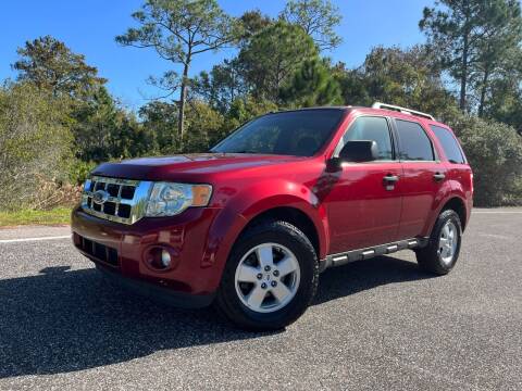2009 Ford Escape for sale at VICTORY LANE AUTO SALES in Port Richey FL