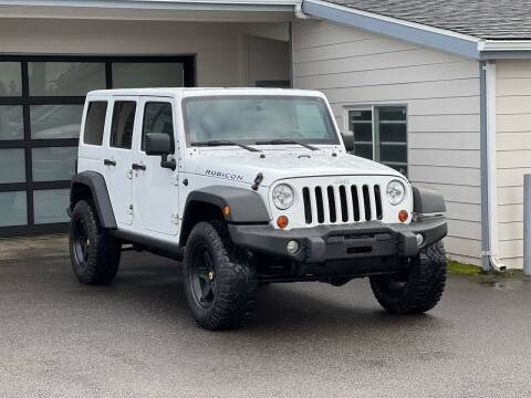 2012 Jeep Wrangler Unlimited for sale at Lux Motors in Tacoma WA