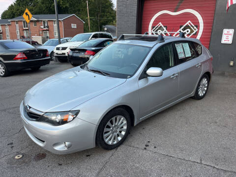 2011 Subaru Impreza for sale at Apple Auto Sales Inc in Camillus NY