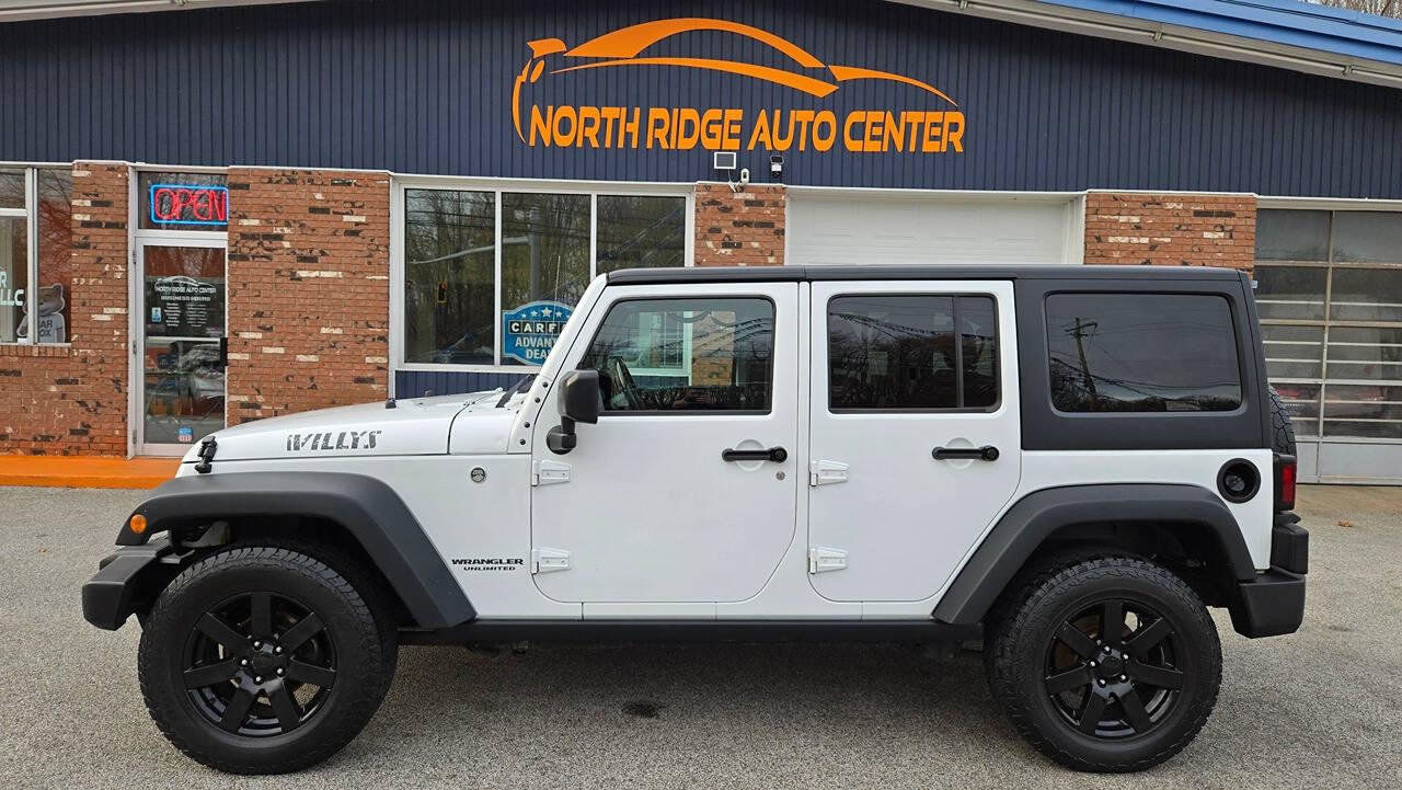 2017 Jeep Wrangler Unlimited for sale at North Ridge Auto Center LLC in Madison, OH