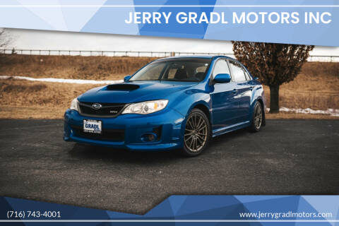 2014 Subaru Impreza for sale at JERRY GRADL MOTORS INC in North Tonawanda NY
