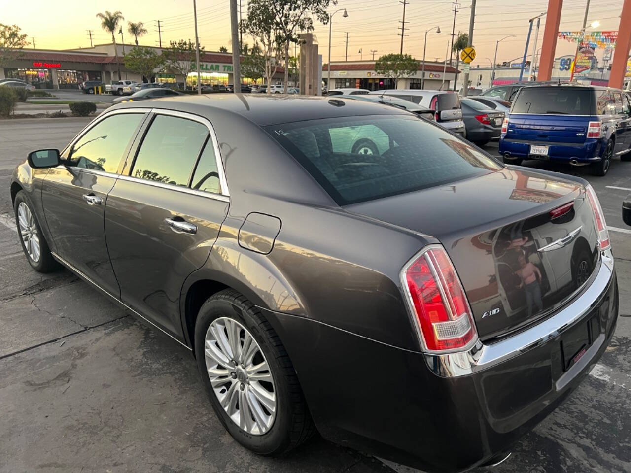 2014 Chrysler 300 for sale at Unique Auto Sales, Inc. in Bell, CA