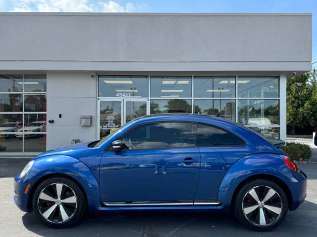 2013 Volkswagen Beetle for sale at Opus Motorcars in Utica, MI