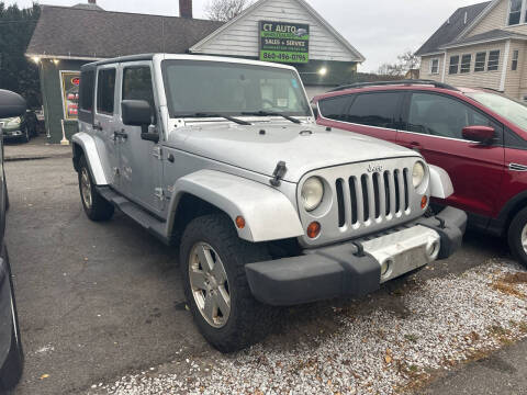 2009 Jeep Wrangler Unlimited for sale at Connecticut Auto Wholesalers in Torrington CT