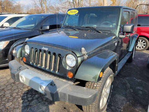 2010 Jeep Wrangler Unlimited for sale at JERRY GRADL MOTORS INC in North Tonawanda NY