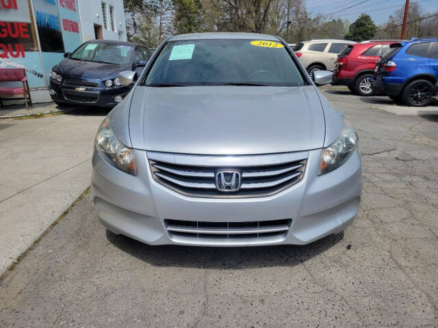 2012 Honda Accord for sale at DAGO'S AUTO SALES LLC in Dalton, GA