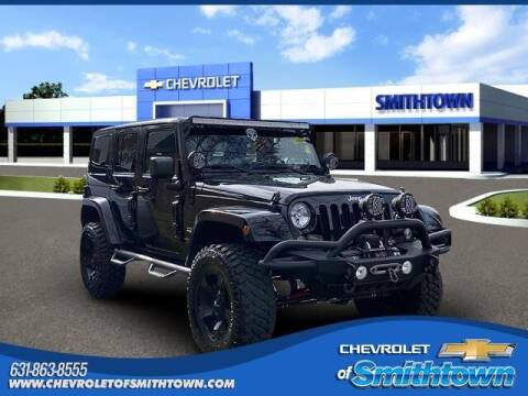 2014 Jeep Wrangler Unlimited for sale at CHEVROLET OF SMITHTOWN in Saint James NY