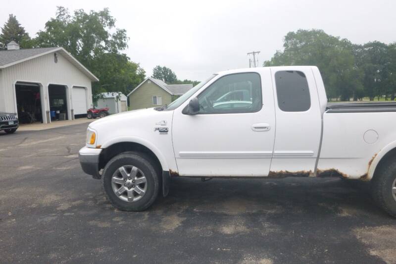 1999 Ford F-150 for sale at JIM WOESTE AUTO SALES & SVC in Long Prairie MN
