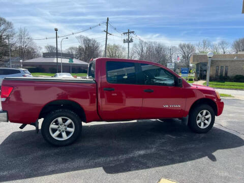 2010 Nissan Titan for sale at VINE STREET MOTOR CO in Urbana IL