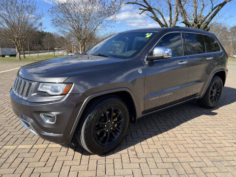 2014 Jeep Grand Cherokee for sale at PFA Autos in Union City GA