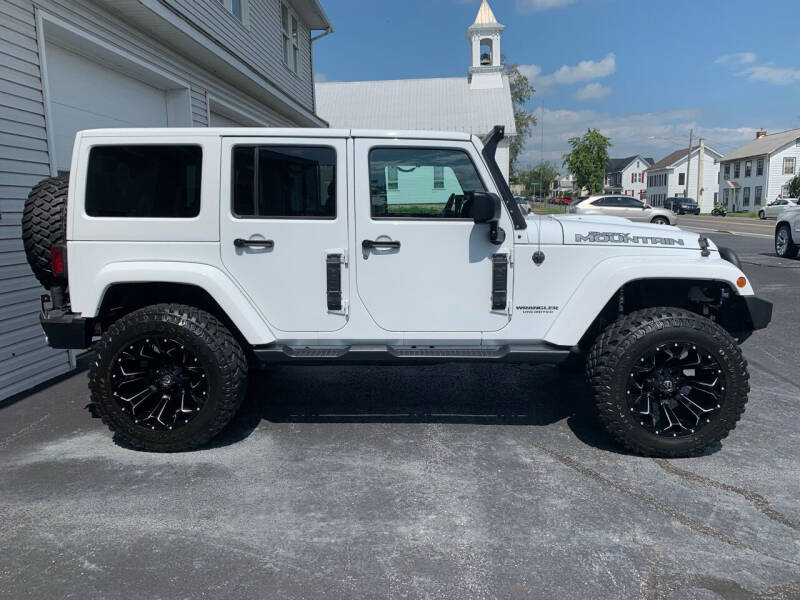 2017 Jeep Wrangler Unlimited for sale at VILLAGE SERVICE CENTER in Penns Creek PA