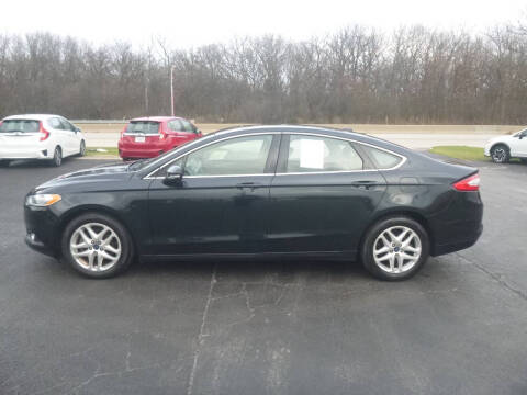 2014 Ford Fusion for sale at NEW RIDE INC in Evanston IL