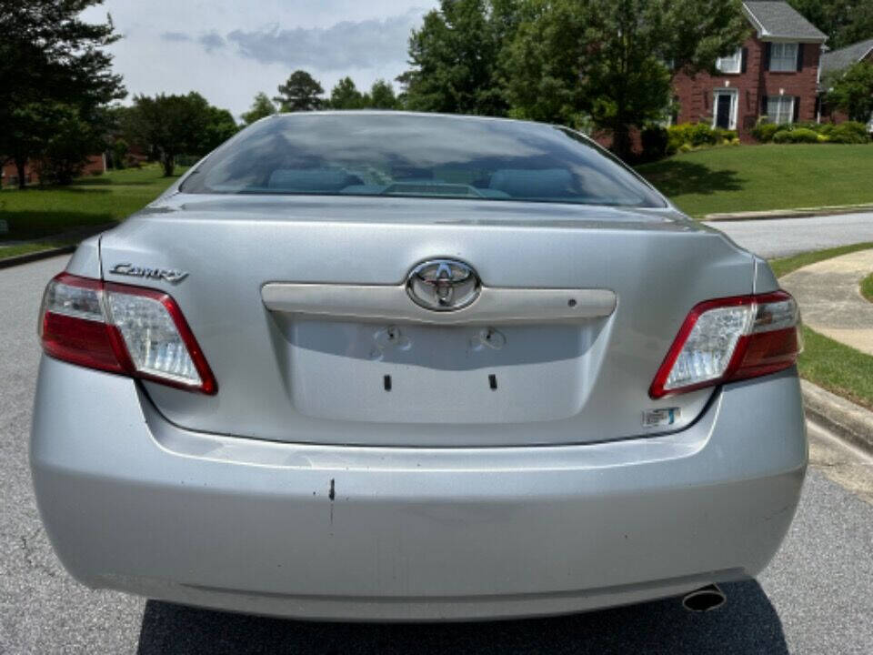 2007 Toyota Camry Hybrid for sale at SHURE AUTO SALES in Snellville, GA