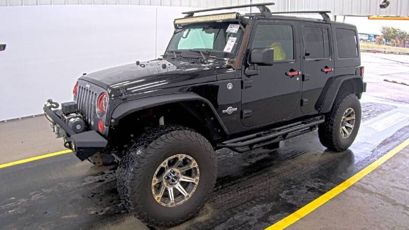 2013 Jeep Wrangler Unlimited for sale at HERMANOS SANCHEZ AUTO SALES LLC in Dallas TX