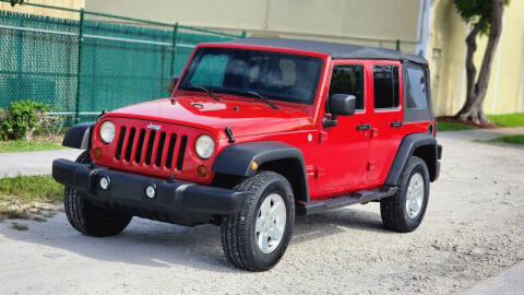 2011 Jeep Wrangler Unlimited for sale at Maxicars Auto Sales in West Park FL