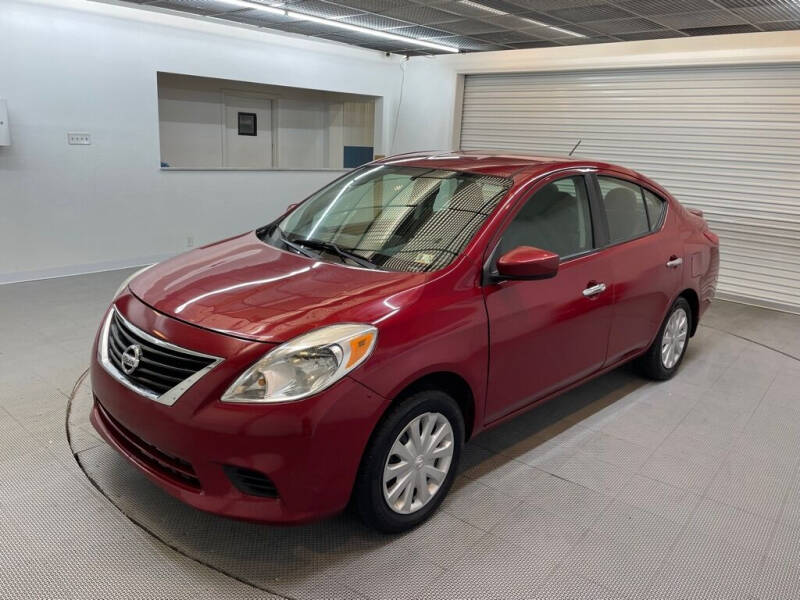 2014 Nissan Versa for sale at AHJ AUTO GROUP LLC in New Castle PA