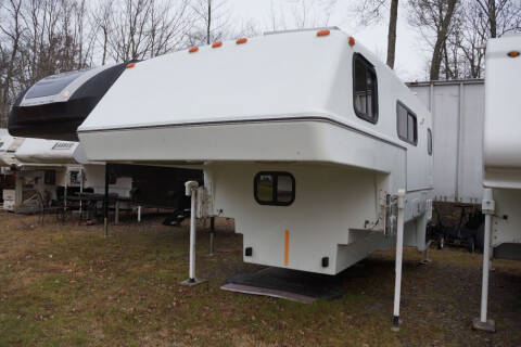 2006 Bigfoot 10.6 for sale at Polar RV Sales in Salem NH