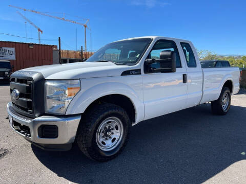 2015 Ford F-250 Super Duty for sale at BERKENKOTTER MOTORS in Brighton CO