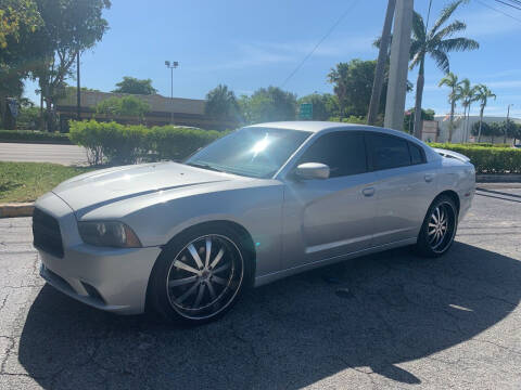 2012 Dodge Charger for sale at CarMart of Broward in Lauderdale Lakes FL