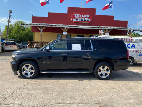 2015 Chevrolet Suburban for sale at Taylor Trading Co in Beaumont TX