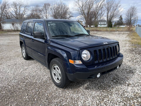 2014 Jeep Patriot for sale at HEDGES USED CARS in Carleton MI