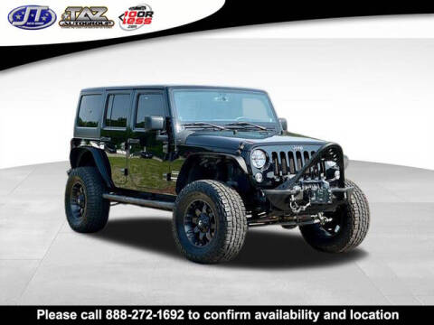 2014 Jeep Wrangler Unlimited for sale at J T Auto Group in Sanford NC