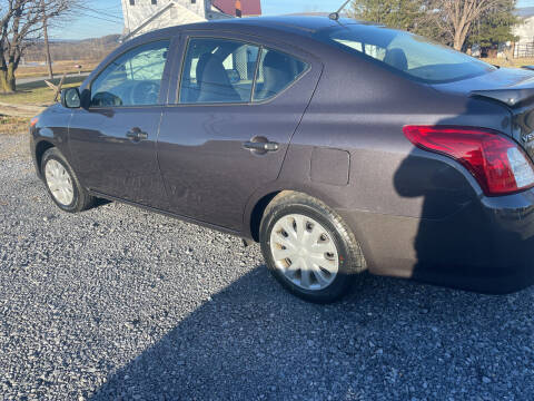 2015 Nissan Versa for sale at CESSNA MOTORS INC in Bedford PA