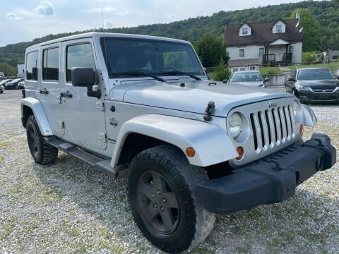 2012 Jeep Wrangler Unlimited for sale at Ron Motor Inc. in Wantage NJ