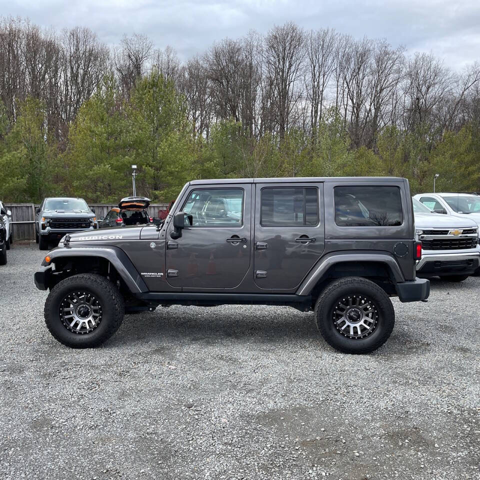 2014 Jeep Wrangler Unlimited for sale at JM4 Auto in Webster, NY