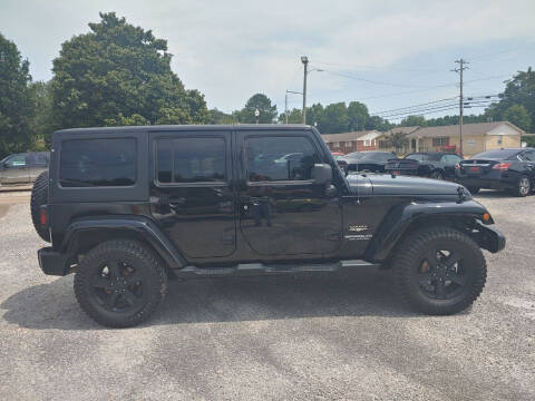 2013 Jeep Wrangler Unlimited for sale at VAUGHN'S USED CARS in Guin AL